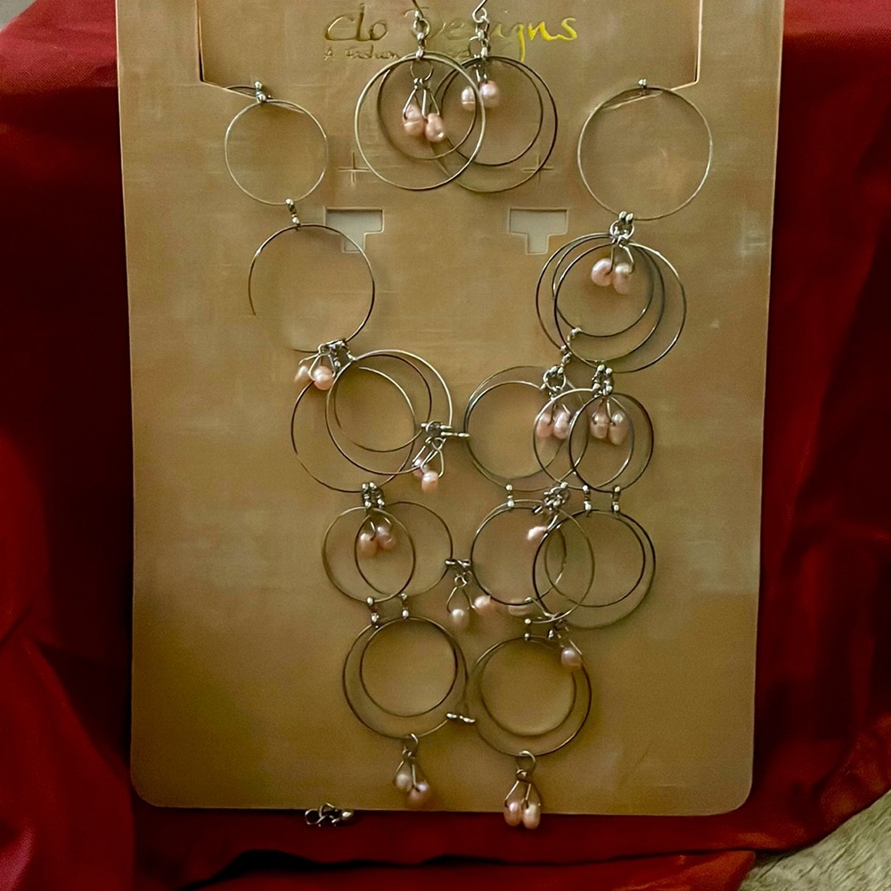 Necklace and earrings by Clo